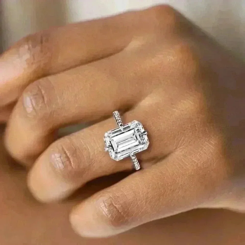 Italo Jewelry Hidden Halo Emerald Cut Engagement and pave band